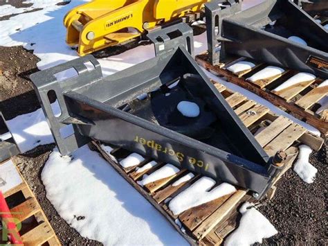 skid steer ice scraper attachment|ripper attachment for skid steer.